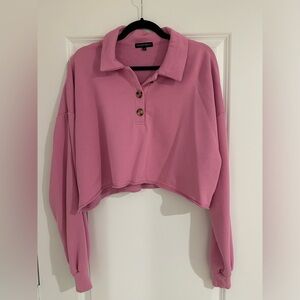 Pink cropped collared long sleeve top